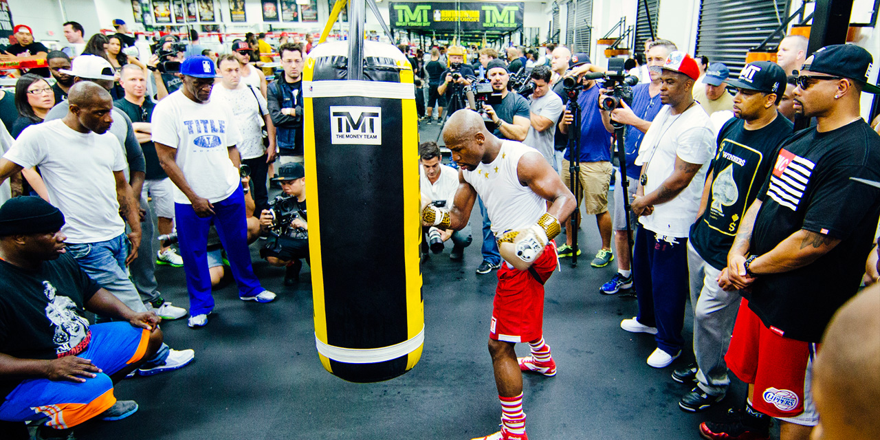 mayweather hitting bag